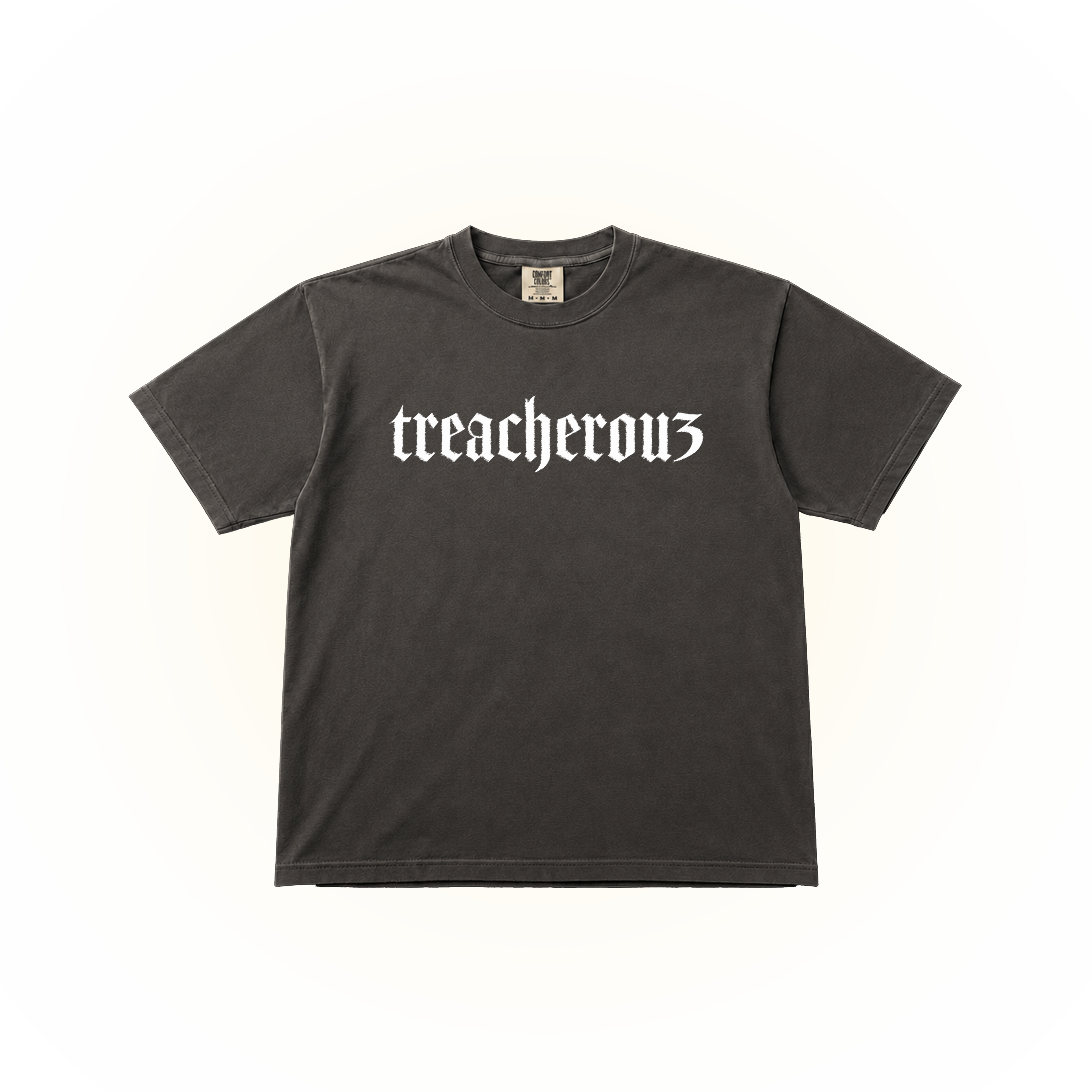 Pepper t-shirt with 'treacherous' text but the s is a 3 for Jaden McDaniels. This graphic is on a pepper Comfort Colors t-shirt