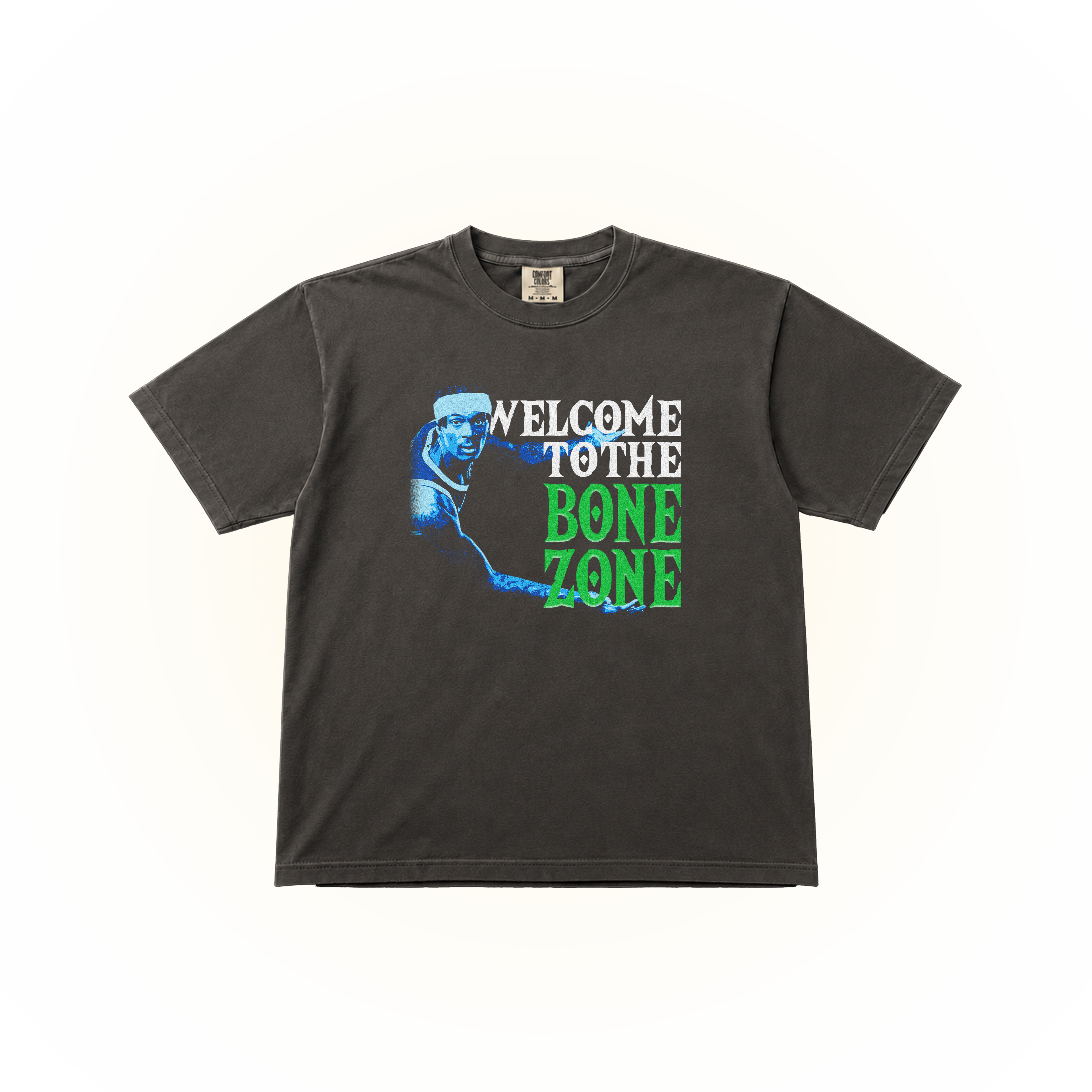 Pepper Comfort Colors t-shirt with graphic design of Bones Hyland and text 'Welcome to the Bone Zone'