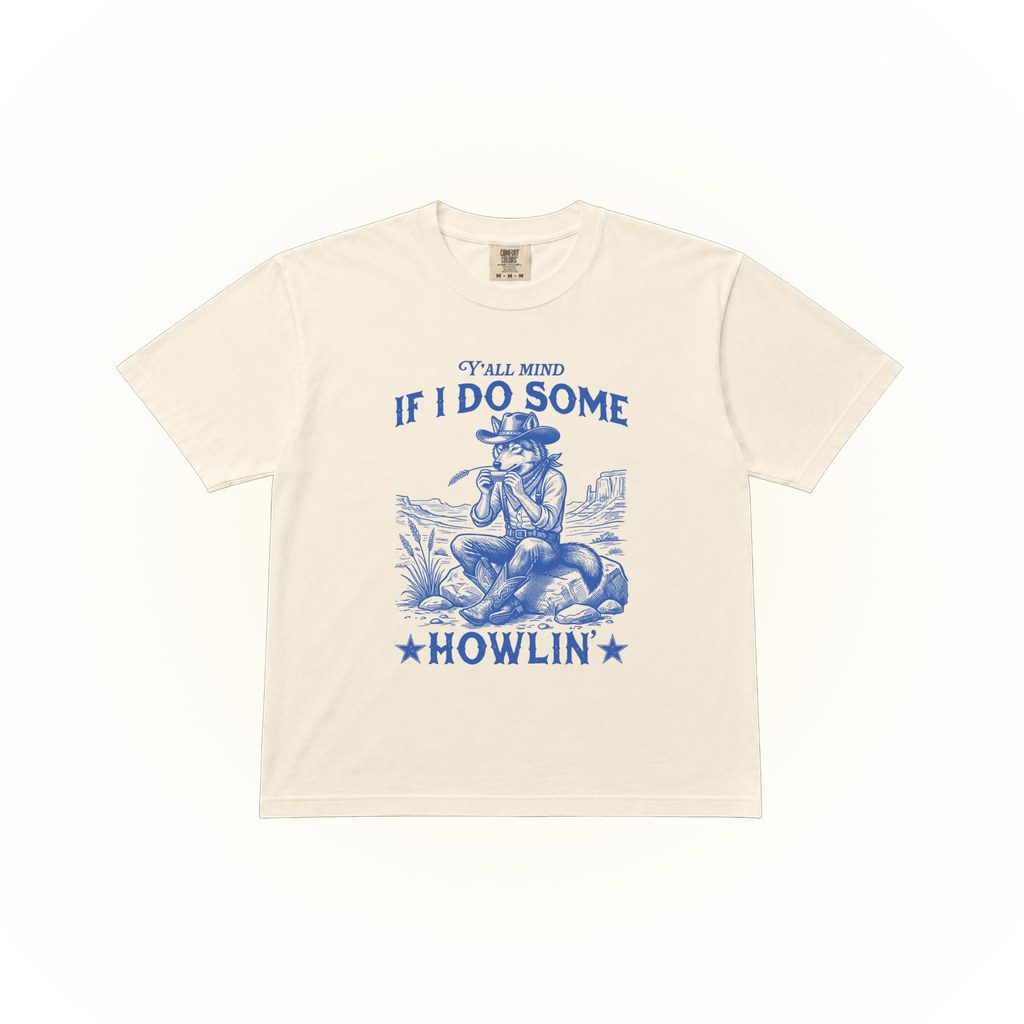 Western style wolf graphic asking "Y'all mind if I do some howling'?" on a ivory Comfort Colors t-shirt